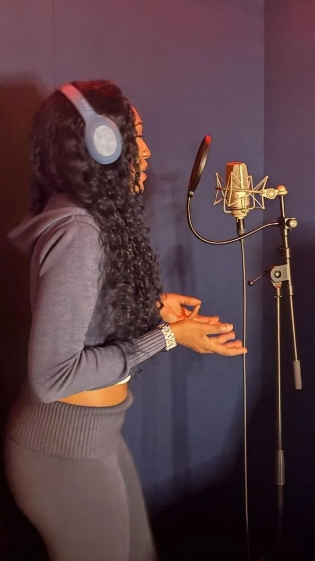 voice of Elou delivering professional voiceover services in recording studio